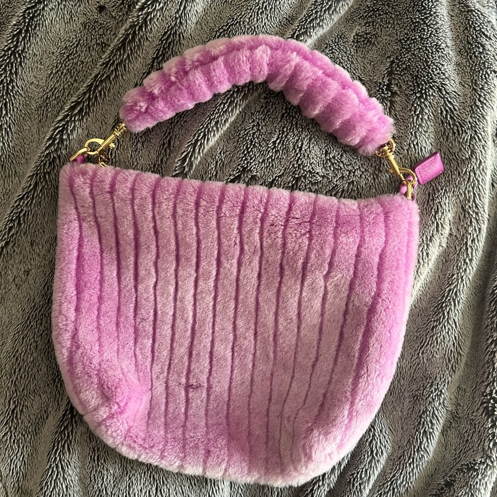 UGG magenta fluffy purse with gold zipper